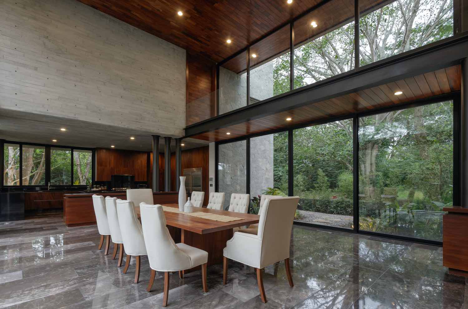 dining area with spectacular nature view though large glass walls 