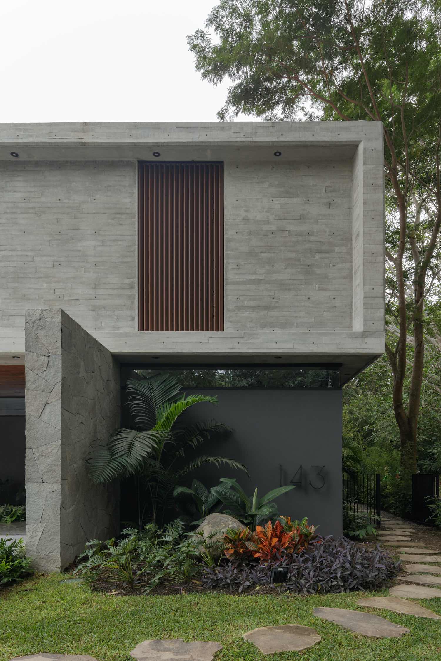 house surrounded with tropical vegetation 