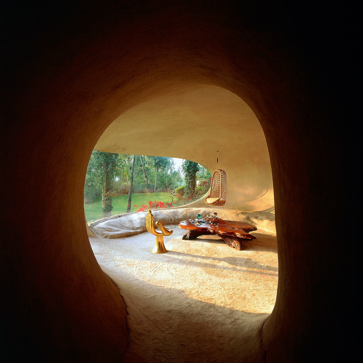 sunlight enters to the living area through large window 